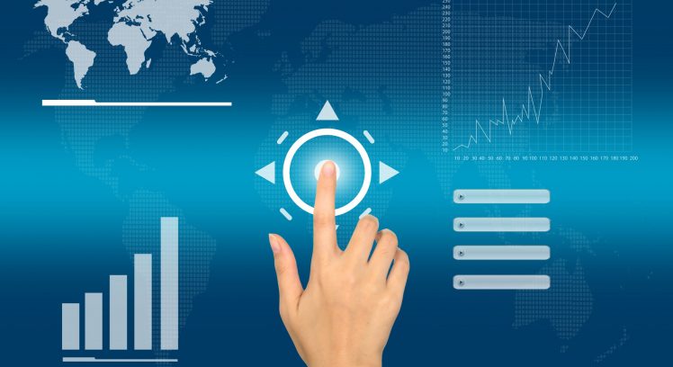 Business hand pushing a button on a touch screen interface