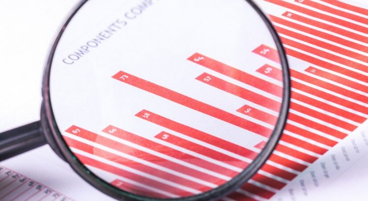 magnifying-glass-business-growth-graph_93675-14508