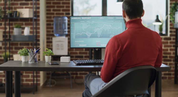 Project manager looking at computer with forex echange charts, working on financial statistics with sales data and project investment. Trading analyst using stock market trend and index.