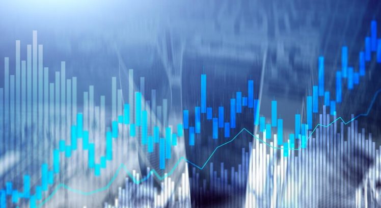 stock-trading-candlestick-chart-diagrams-blurred-office-center-background_161452-11784